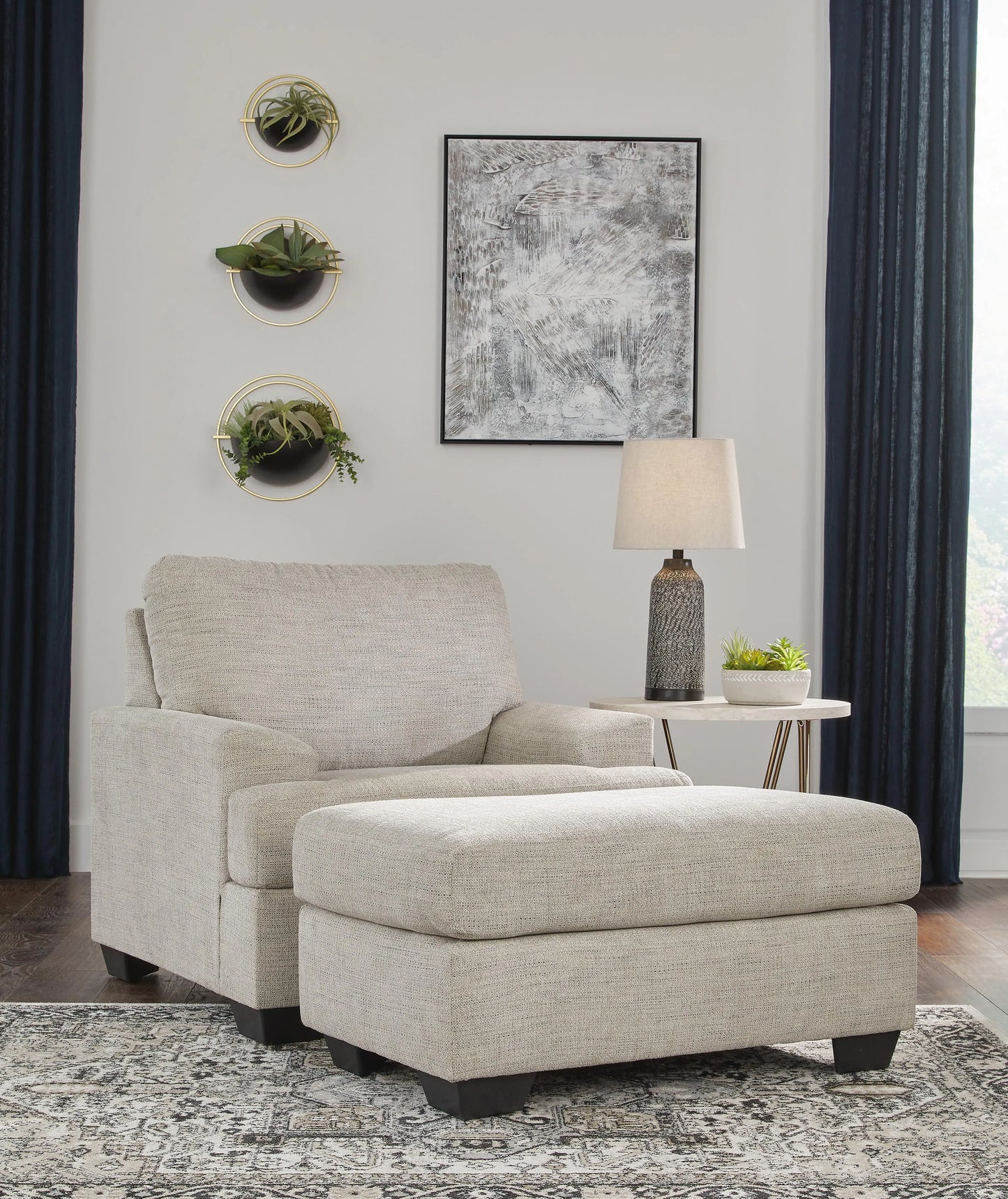 Sillón y otomana Vayda