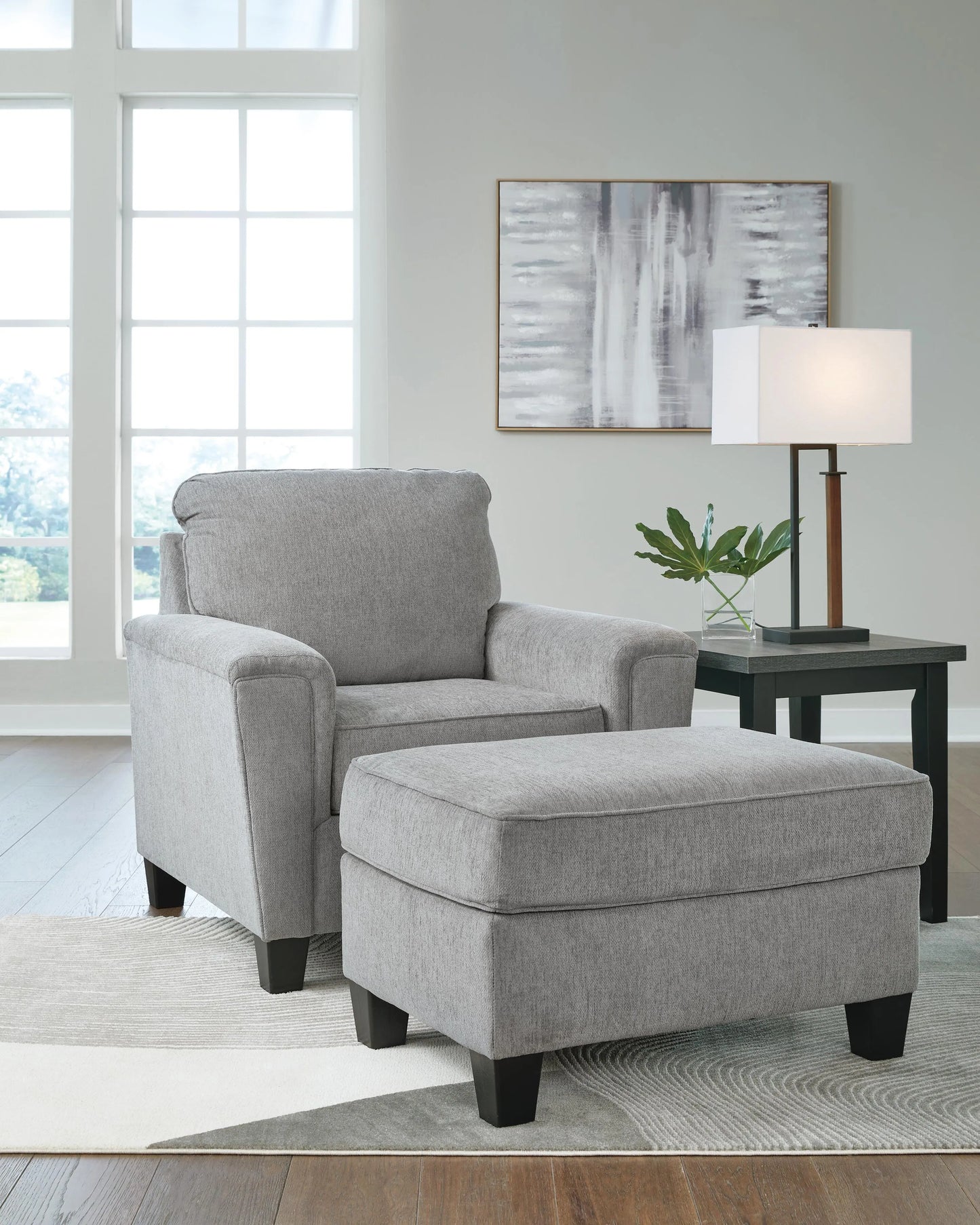 Sillón y otomana Leeshan