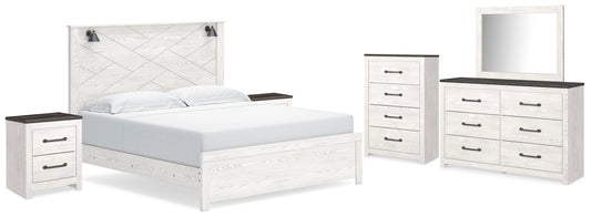 Cama con paneles Gerridan King, cómoda, espejo, arcón y 2 mesitas de noche