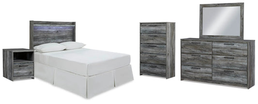 Cabecero de panel completo de la cama Baystorm. Cómoda, espejo, baúl y mesita de noche.