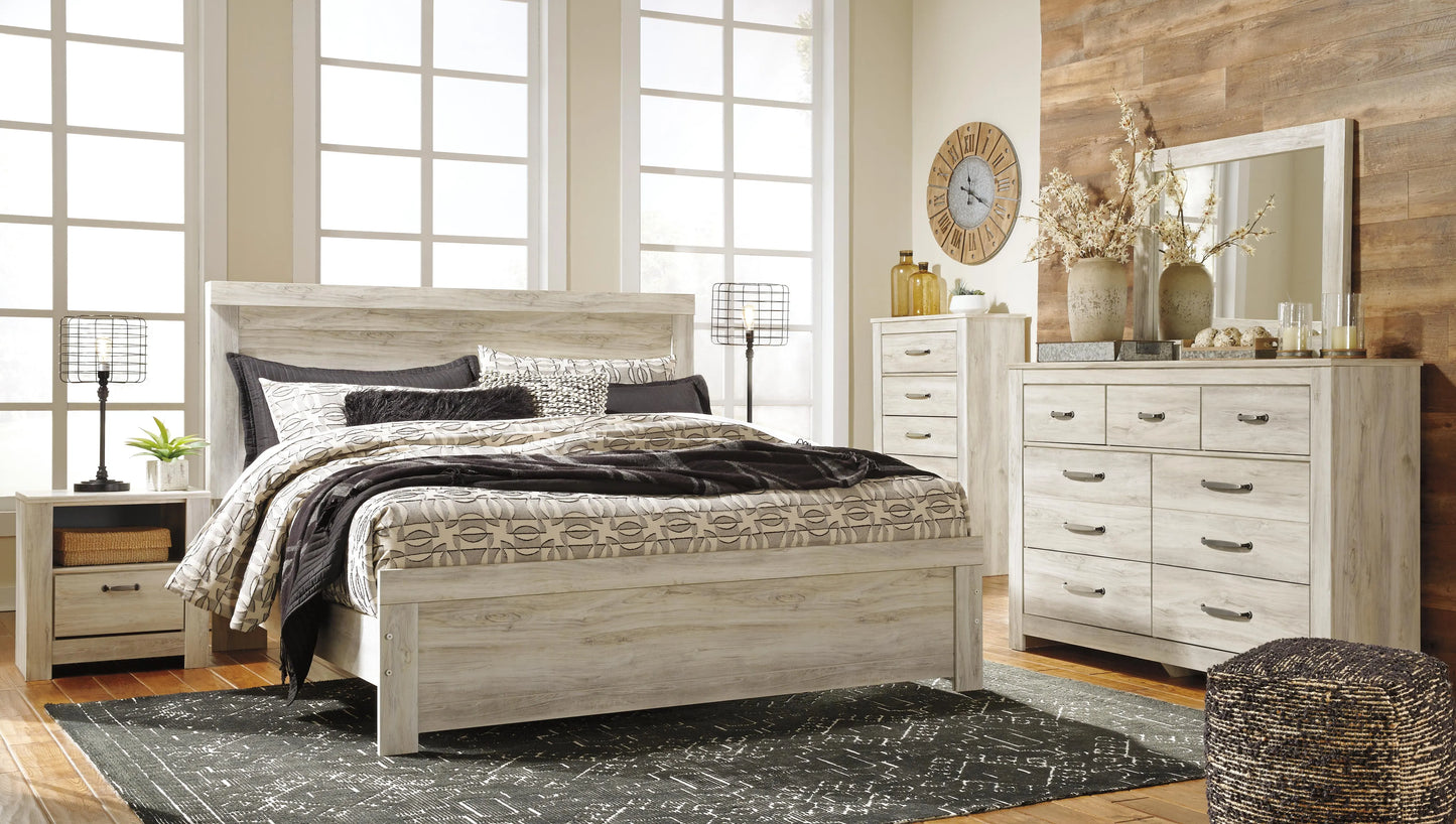 Cama Bellaby King con panel, cómoda, espejo, arcón y 2 mesitas de noche