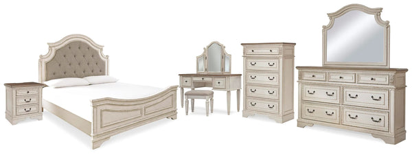 Cama de paneles Realyn King, cómoda, espejo, arcón, tocador y mesita de noche