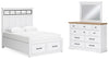 Cama Ashbryn Queen con panel de almacenaje, cómoda y espejo