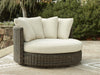 Sillón giratorio de exterior Kimora con cojín